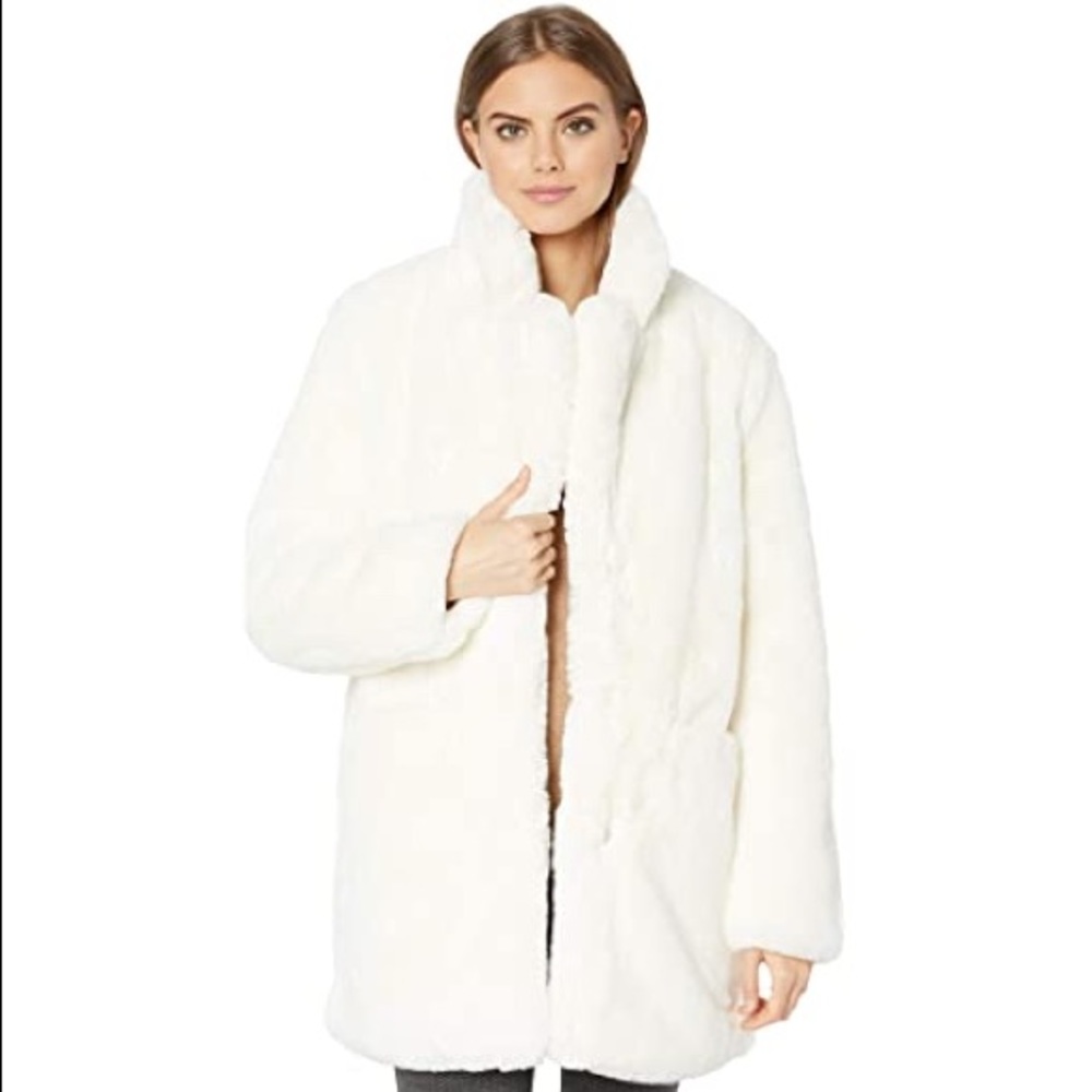 White faux fur coat
